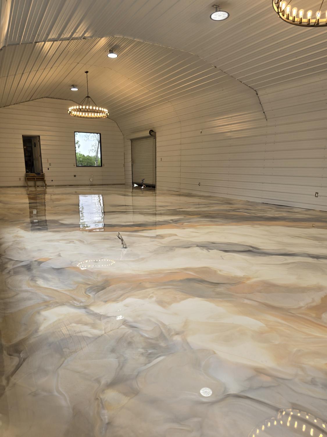 Cream and gold metallic epoxy in large building